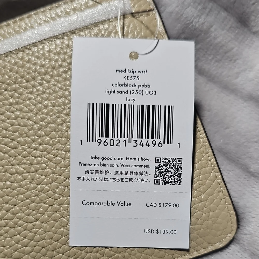 Kate Spade Cream and White Wristlet